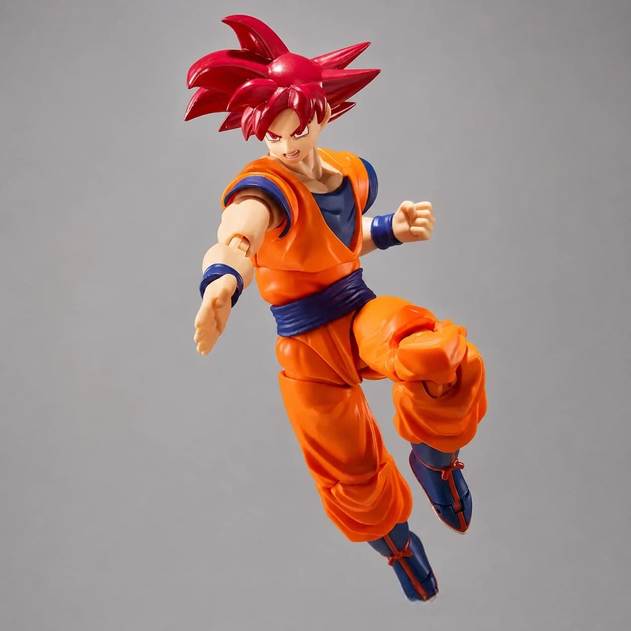Dragon Ball Super Goku Super Saiyan God Action Figure – 15 cm Articulated Collectible with Interchangeable Faces & Hands